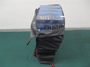 Three incoming passengers were sentenced to seven to eight months' imprisonment and fined $1,000 each by the West Kowloon Magistrates' Courts today (April 20) for importing and possessing duty-not-paid cigarettes and failing to declare them to Customs officers, in contravention of the Dutiable Commodities Ordinance. Photo shows the duty-not-paid cigarettes seized from the personal baggage of a 32-year-old incoming male passenger at Hong Kong-Zhuhai-Macao Bridge.
