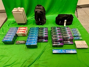 An incoming male passenger was sentenced to two months' imprisonment and fined $1,000 by the West Kowloon Magistrates' Courts today (April 24) for importing duty-not-paid cigarettes and failing to declare them to Customs officers, in contravention of the Dutiable Commodities Ordinance. Photo shows the duty-not-paid cigarettes seized.