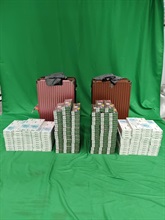 Three incoming passengers were sentenced to four weeks' to five months' imprisonment and fined $1,000 respectively by the Magistrates' Courts today (June 11) for possessing or importing duty-not-paid cigarettes and failing to declare them to Customs officers, in contravention of the Dutiable Commodities Ordinance. Photo shows the duty-not-paid cigarettes seized from the personal baggage of a 56-year-old incoming male passenger.