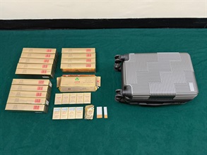 An incoming male passenger was sentenced to a total of 10 weeks' imprisonment and fined $3,300 by the Fanling Magistrates' Courts today (May 20) for possessing duty-not-paid cigarettes and failing to declare them to Customs officers, in contravention of the Dutiable Commodities Ordinance. Photos show the duty-not-paid cigarettes seized in the second interception.
