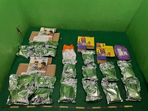 Hong Kong Customs today (May 26) detected two drug trafficking cases involving passengers at Hong Kong International Airport and seized about 11 kilograms of suspected cannabis buds and 18kg of suspected ketamine, with a total estimated market value of about $8.85 million. Photo shows the suspected ketamine seized in the second case.