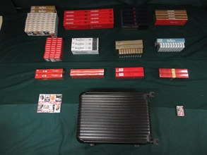 Two incoming female passengers were respectively sentenced to two months' imprisonment and a fine of $1,000, and four weeks' imprisonment and a fine of $1,000 by the Fanling Magistrates' Courts today (June 2) for possessing duty-not-paid cigarettes and failing to declare them to Customs officers in contravention of the Dutiable Commodities Ordinance. Photo shows the duty-not-paid cigarettes seized from personal belongings of a 56-year-old incoming female passenger.