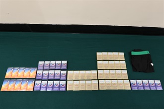 Two incoming female passengers were respectively sentenced to two months' imprisonment and a fine of $1,000, and four weeks' imprisonment and a fine of $1,000 by the Fanling Magistrates' Courts today (June 2) for possessing duty-not-paid cigarettes and failing to declare them to Customs officers in contravention of the Dutiable Commodities Ordinance. Photo shows the duty-not-paid cigarettes seized from a 54-year-old incoming female passenger.