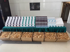 Hong Kong Customs detected a suspected a smuggling case involving a cross-boundary goods vehicle on June 4. Large batches of suspected smuggled goods with a total estimated market value of about $10 million were seized. Photo shows the suspected smuggled goods seized.