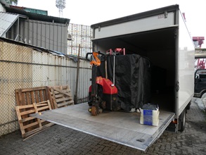 Hong Kong Customs and the Fire Services Department mounted a territory-wide operation targeting illicit fuel activities on June 10. During the operation, officers of the two departments detected two related cases and seized about 3 200 litres of illicit motor spirit, with an estimated market value of about $104,000 and a duty potential of about $20,000. Two persons were arrested, and one vehicle connected with one of the cases was also seized. A vehicle connected with one of the cases was seized, and two persons were arrested. Photo shows an illegal mobile fuelling station raided in Kwai Chung.