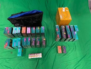 Five incoming passengers were sentenced to six weeks' to four months' imprisonment and fined $1,000 respectively by the Magistrates' Courts today (June 15) for possessing or importing duty-not-paid cigarettes and failing to declare to Customs Officers, in contravention of the Dutiable Commodities Ordinance, as well as for importing alternative smoking products (ASPs), in contravention of the Dutiable Commodities Ordinance and the Import and Export Ordinance. Photo shows the duty-not-paid cigarettes and ASPs seized from the personal baggage of an incoming 29-year-old Chinese male passenger.