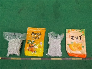 Hong Kong Customs detected two trafficking drugs cases involving baggage concealment at Hong Kong International Airport today (June 15), and seized a total of about 4.5 kilograms of suspected cannabis buds and 5kg of suspected ketamine with a total estimated market value of about $2.7 million. Photo shows the suspected cannabis buds seized in the first case.