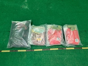 Hong Kong Customs detected two drug trafficking cases involving baggage concealment at Hong Kong International Airport yesterday (June 19), and seized a total of about 6 kilograms of suspected ketamine and 5kg of suspected cannabis buds with a total estimated market value of about $3.4 million. Two men were arrested. Photo shows the suspected ketamine seized in the first case.