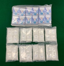 Hong Kong Customs seized suspected dangerous drugs at Hong Kong International Airport and in Lai Chi Kok on January 16 and yesterday (January 19) respectively, including about 19.2 kilograms of suspected ketamine, about 1.8 kilograms of suspected methamphetamine and about 700 grams of suspected cocaine. The total estimated market value is about $14 million. Photo shows the suspected ketamine seized and the milk powder package boxes used to conceal the dangerous drugs.