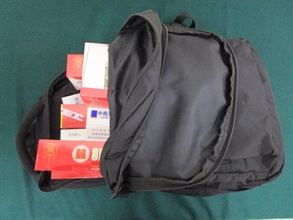 An incoming Chinese female passenger was sentenced to four weeks' imprisonment by the Fanling Magistrates' Courts today (June 26) for possessing duty-not-paid cigarettesand failing to declare them to Customs officers, in contravention of the Dutiable Commodities Ordinance. Photo shows the duty-not-paid cigarettes seized.
