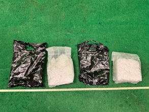 Hong Kong Customs yesterday (June 27) detected a drug trafficking case involving air cargo at Hong Kong International Airport and seized a total of about 800 grams of suspected cocaine and about two kilograms of suspected methamphetamine with a total estimated market value of about $1.4 million. One person was arrested. Photo shows the suspected methamphetamine seized.