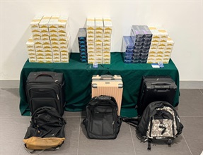 Three incoming Chinese passengers were each sentenced to six weeks' imprisonment and fined $1,000 by the West Kowloon Magistrates' Courts today (June 29) for possession of duty-not-paid cigarettes and failing to declare them to Customs officers, in contravention of the Dutiable Commodities Ordinance. Photo shows the duty-not-paid cigarettes seized.