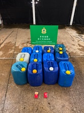 Hong Kong Customs yesterday (June 28) intercepted a speedboat in the waters south off Cheung Chau and seized 240 litres of suspected illicit motor spirit and 34 suspected illicit cigarettes. During the operation, one local man was arrested. Photo shows the suspected illicit motor spirit and suspected illicit cigarettes seized.