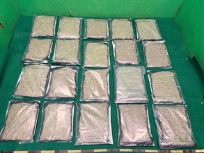 Hong Kong Customs yesterday (July 1) detected a drug trafficking case involving baggage concealment at Hong Kong International Airport and seized about 10 kilograms of suspected cannabis buds with an estimated market value of about $1.8 million. Photo shows the suspected cannabis buds seized.