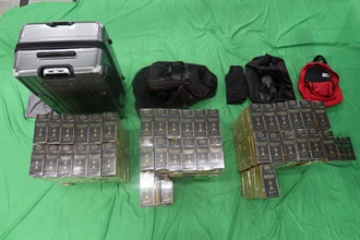An incoming male passenger was sentenced to eight months' imprisonment and fined $1,000 by the West Kowloon Magistrates' Courts today (July 7) for possession of duty-not-paid cigarettes and failing to declare them to Customs officers, in contravention of the Dutiable Commodities Ordinance. Photo shows the duty-not-paid cigarettes seized.