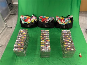 An incoming male passenger was sentenced to eight months' imprisonment and fined $1,000 by the West Kowloon Magistrates' Courts today (July 8) for importing duty-not-paid cigarettes and failing to declare them to Customs officers, in contravention of the Dutiable Commodities Ordinance. Photo shows the duty-not-paid cigarettes seized.