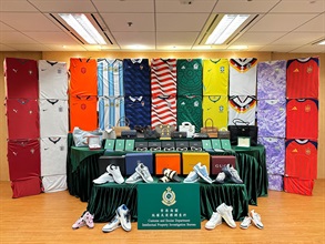 Hong Kong Customs on June 24 seized about 6 300 suspected counterfeit goods with an estimated market value of about $3.1 million at the Hong Kong-Zhuhai-Macao Bridge Hong Kong Port. Photo shows the suspected counterfeit goods seized, including jerseys, handbags and footwear.