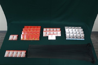 An incoming female passenger was sentenced to two months' imprisonment with a fine of $2,000 by the Fanling Magistrates' Courts today (July 15) for possessing duty-not-paid cigarettes and failing to declare them to Customs officers, in contravention of the Dutiable Commodities Ordinance. Photo shows the duty-not-paid cigarettes seized.