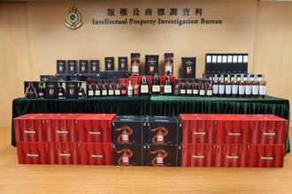 Hong Kong Customs mounted a special operation in June in various districts to combat the sale of counterfeit liquor. A total of 720 bottles of suspected counterfeit liquor, with a total volume of about 575 litres and an estimated market value of about $880,000, were seized. Photo shows some of the suspected counterfeit liquor seized.