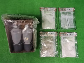 Hong Kong Customs yesterday (January 12) seized two batches of suspected dangerous drugs in Tsuen Wan and Sha Tin, including about 6 kilograms of suspected cannabis buds, about 3.5kg of suspected heroin, about 1.7kg of suspected liquid cocaine, about 410 grams of suspected ketamine, about 170g of suspected methamphetamine and about 5g of suspected crack cocaine. The total estimated market value is about $8.3 million. Photo shows the suspected liquid cocaine, suspected ketamine, suspected methamphetamine and suspected crack cocaine seized.