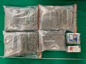 Hong Kong Customs yesterday (July 17) detected a drug trafficking case involving an incoming air passenger at Hong Kong International Airport and seized about seven kilograms of suspected cannabis buds, 40 grams of suspected cannabis biscuits and 20g of suspected cannabis gummy candies with an estimated market value of about $1.3 million. Photo shows the suspected cannabis buds and suspected cannabis products seized.