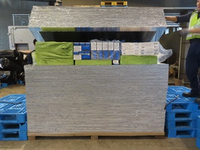 Hong Kong Customs seized about 400 000 suspected illicit cigarettes with an estimated market value of about $1.8 million and a duty potential of about $1.3 million at the Customs Tsing Yi Cargo Examination Compound, yesterday (July 17). Photo shows some of the suspected illicit cigarettes seized.