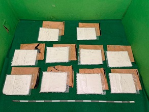 Hong Kong Customs yesterday (July 18) and today (July 19) detected three drug trafficking cases involving incoming air passengers at Hong Kong International Airport, and seized a total of about seven kilograms of suspected cannabis buds, about 15kg of suspected ketamine, about 1kg of suspected cocaine and 587 tablets of suspected Part I poison, with a total estimated market value of about $7.9 million. A man and two women were arrested. Photo shows some of the suspected ketamine seized in the second case.