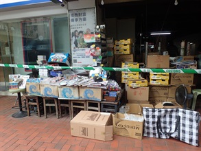 Hong Kong Customs has been mounting an enforcement operation targeting cigarette retail points in various districts since July 12. A total of about 130 000 suspected illicit cigarettes, with an estimated market value of about $590,000 and a duty potential of about $430,000 were seized. Eleven persons were arrested. Photo shows one of the cigarette retail points connected with the cases.