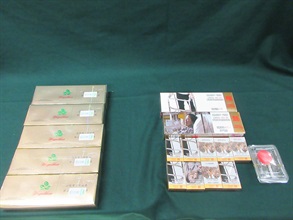 An incoming female passenger was sentenced to a total of 10 weeks' imprisonment and fined $2,000 by the Fanling Magistrates' Courts today (July 31) for possessing duty-not-paid cigarettes and failing to declare them to Customs officers, in contravention of the Dutiable Commodities Ordinance. Photos shows the duty-not-paid cigarettes seized in the second interception.