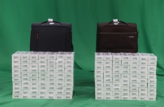 An incoming male passenger was sentenced to six months' imprisonment and fined $1,000 by the West Kowloon Magistrates' Courts today (August 3) for possession of duty-not-paid cigarettes and failing to declare them to Customs officers, in contravention of the Dutiable Commodities Ordinance. Photo shows the duty-not-paid cigarettes seized.