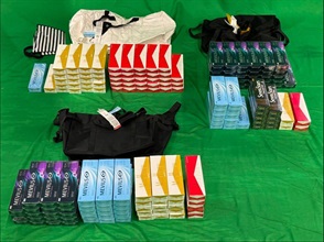 An incoming male passenger was sentenced to six months' imprisonment and fined $2,000 by the West Kowloon Magistrates' Courts today (August 6) for importing duty-not-paid cigarettes and failing to declare them to Customs officers, in contravention of the Dutiable Commodities Ordinance. Photo shows the duty-not-paid cigarettes seized.