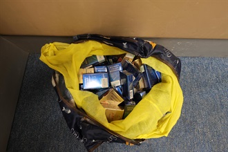 An incoming Mainland female passenger was sentenced to 10 weeks' imprisonment with a fine of $2,000 by the Tuen Mun Magistrates' Courts today (August 8) for possessing duty-not-paid cigarettes and failing to declare them to Customs officers, in contravention of the Dutiable Commodities Ordinance. Photo shows the duty-not-paid cigarettes seized.