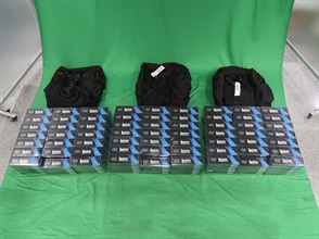An incoming passenger was sentenced to eight months' imprisonment and fined $2,000 by the West Kowloon Magistrates' Courts today (August 10) for importing duty-not-paid cigarettes and failing to declare them to Customs officers, in contravention of the Dutiable Commodities Ordinance. Photo shows the duty-not-paid cigarettes seized.