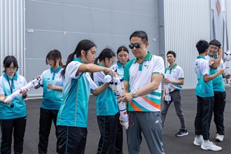Hong Kong Customs organised the Hainan Aerospace Technology and Sustainable Development Exploration Tour for Customs YES from August 7 to 12. Photo shows the Commissioner of Customs and Excise, Mr Chan Tsz-tat (fourth right), leading Customs YES members to visit the iSpace AITR Factory for Reusable Launch Vehicles to learn about new technologies such as reusable launch vehicles and to make water rocket together.