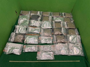 Hong Kong Customs yesterday (August 12) detected two drug trafficking cases involving incoming air passengers at Hong Kong International Airport and seized a total of about 24 kilograms of suspected cannabis buds with a total estimated market value of about $5 million. Photo shows the suspected cannabis buds seized in the second case.