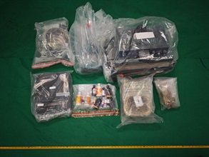 Hong Kong Customs yesterday (August 18) shut down a suspected drug manufacturing centre in Kowloon Bay and a suspected drug distribution centre in Yau Tong and seized about 1.9 kilograms of suspected cannabis oil, about 2.4kg of cannabis-infused gummy candies and about 2 200 sticks of suspected cannabis oil vape capsules. The total estimated market value was about $1.3 million. A 46-year-old man suspected to be connected with the case was arrested. Photo shows the suspected drug manufacturing and packaging paraphernalia seized.
