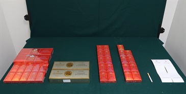 An incoming local male passenger was sentenced to four weeks' imprisonment with a fine of $1,000 by the Fanling Magistrates' Courts today (August 19) for possessing duty-not-paid cigarettes and failing to declare them to Customs officers, in contravention of the Dutiable Commodities Ordinance. Photo shows the duty-not-paid cigarettes seized.
