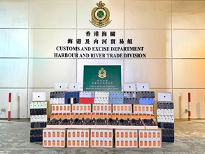 Hong Kong Customs from August 12 to 14 seized a total of about 25 000 suspected counterfeit goods and 1 000 suspected illicit cigarettes with a total estimated market value of about $8.5 million at the Tuen Mun River Trade Terminal. Photo shows some of the suspected counterfeit goods seized.