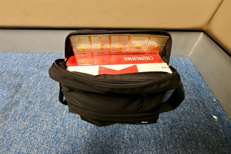 An incoming local male passenger was sentenced to two months' imprisonment with a fine of $1,200 by the Fanling Magistrates' Courts today (August 28) for possessing duty-not-paid cigarettes and failing to declare them to Customs officers, in contravention of the Dutiable Commodities Ordinance. Photo shows the duty-not-paid cigarettes seized in the case.