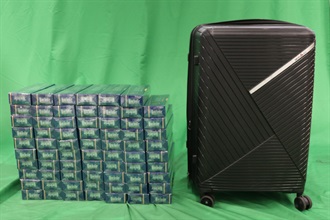 An incoming male passenger was sentenced to five months' imprisonment and fined $2,000 by the West Kowloon Magistrates' Courts today (August 31) for importing of duty-not-paid cigarettes and failing to declare them to Customs officers, in contravention of the Dutiable Commodities Ordinance. Photo shows the duty-not-paid cigarettes seized.
