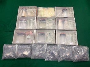 Hong Kong Customs yesterday (September 1) shut down a suspected etomidate manufacturing centre and seized over 3 000 suspected etomidate capsules, about 13.4 kilograms of suspected liquid etomidate, about 3kg of suspected etomidate powder, and a batch of suspected drug manufacturing and packaging paraphernalia in Kam Tin. Photo shows the suspected etomidate seized.