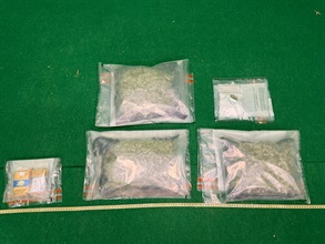 Hong Kong Customs detected a drug trafficking case involving an incoming passenger at Hong Kong International Airport today (September 4) and seized about 2 kilograms of suspected cannabis buds and 21 duty-not-paid cigarettes, with a total estimated market value of about $500,000. A man was arrested. Photo shows the suspected cannabis buds and the duty-not-paid cigarettes seized.