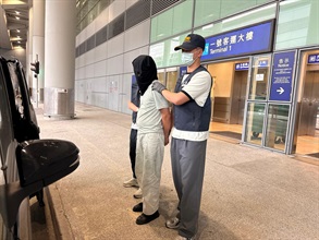 Hong Kong Customs detected a drug trafficking case involving an incoming passenger at Hong Kong International Airport today (September 4) and seized about 2 kilograms of suspected cannabis buds and 21 duty-not-paid cigarettes, with a total estimated market value of about $500,000. A man was arrested. Photo shows the arrested person involved in the case.