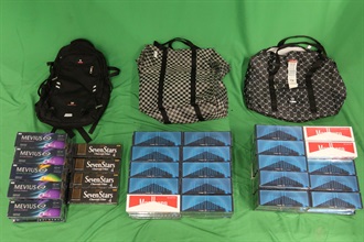 An incoming female passenger was sentenced to three months’ imprisonment and fined $1,500 by the West Kowloon Magistrates' Courts today (September 4) for importing duty-not-paid cigarettes and failing to declare them to Customs officers, in contravention of the Dutiable Commodities Ordinance. Photo shows the duty-not-paid cigarettes seized.