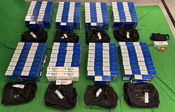 An incoming male passenger was sentenced to ten months' imprisonment and fined $1,000 by the West Kowloon Magistrates' Courts today (September 17) for importing duty-not-paid cigarettes and failing to declare them to Customs officers, in contravention of the Dutiable Commodities Ordinance. Photo shows the duty-not-paid cigarettes seized.