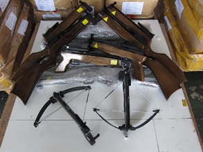 Some of the seized crossbows, with different sizes and draw weights.