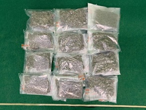 Hong Kong Customs detected two trafficking drugs cases involving baggage concealment at Hong Kong International Airport today (Sep 25) and seized about 6 kilograms of suspected cannabis buds, with a total estimated market value of about $1.2 million. Two men were arrested. Photo shows the suspected cannabis buds seized from the carry-on suitcase of the 31-year-old male passenger.