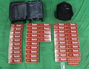 An incoming male passenger was sentenced to four months' imprisonment and fined $2,000 by the West Kowloon Magistrates' Courts today (September 28) for importing duty-not-paid cigarettes and failing to declare them to Customs officers, in contravention of the Dutiable Commodities Ordinance. Photo shows the duty-not-paid cigarettes seized.