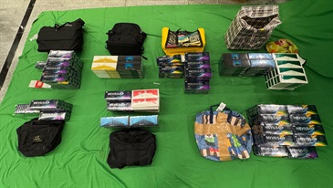 Two incoming passengers were respectively sentenced to four and eight months’ imprisonment and each fined $2,000 by the West Kowloon Magistrates' Courts today (October 5) for importing duty-not-paid cigarettes and failing to declare them to Customs officers, in contravention of the Dutiable Commodities Ordinance. Photo shows the duty-not-paid cigarettes seized from the personal baggage of the incoming female passenger.
