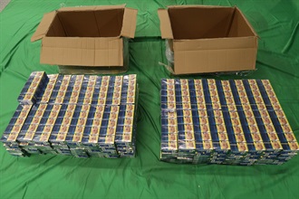 An incoming male passenger was sentenced to six months' imprisonment and fined $2,000 by the West Kowloon Magistrates' Courts today (October 6) for importing duty-not-paid cigarettes and failing to declare them to Customs officers, in contravention of the Dutiable Commodities Ordinance. Photo shows the duty-not-paid cigarettes seized.